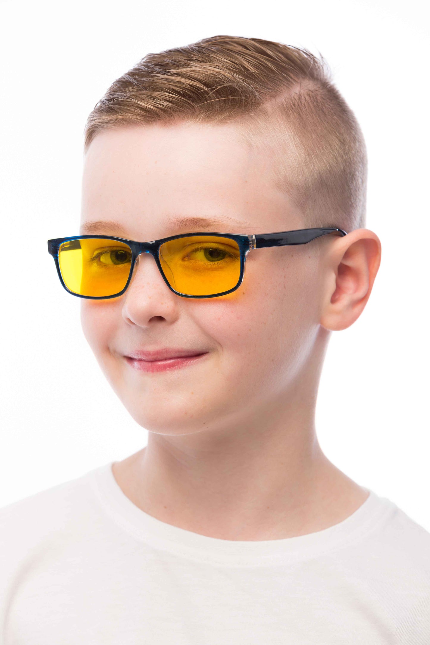 Boy Wearing Theo Light Sensitivity Glasses, Angle view