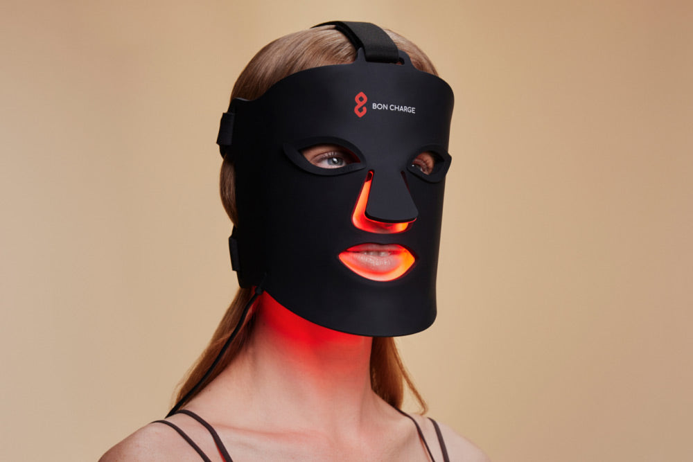 Woman Wearing Red Light Face Mask